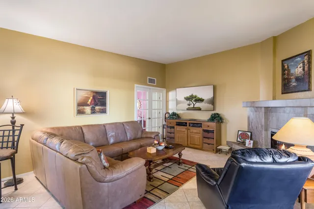 a living room with furniture and a couch
