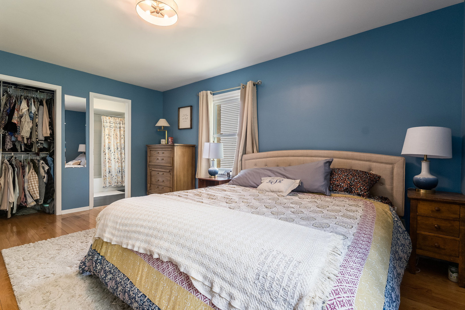 1617 Orth Drive Wheaton, IL 60189 - Photo 11 of 35 a bedroom with a bed and a lamp