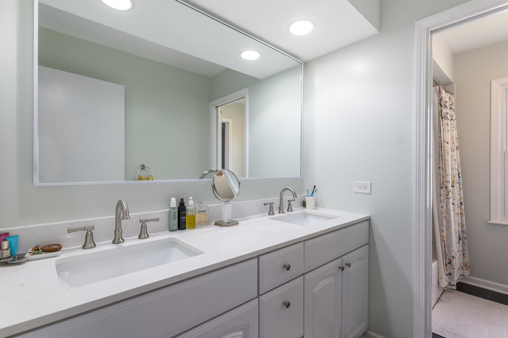 1617 Orth Drive Wheaton, IL 60189 - Photo 12 of 35 a bathroom with a sink and a mirror
