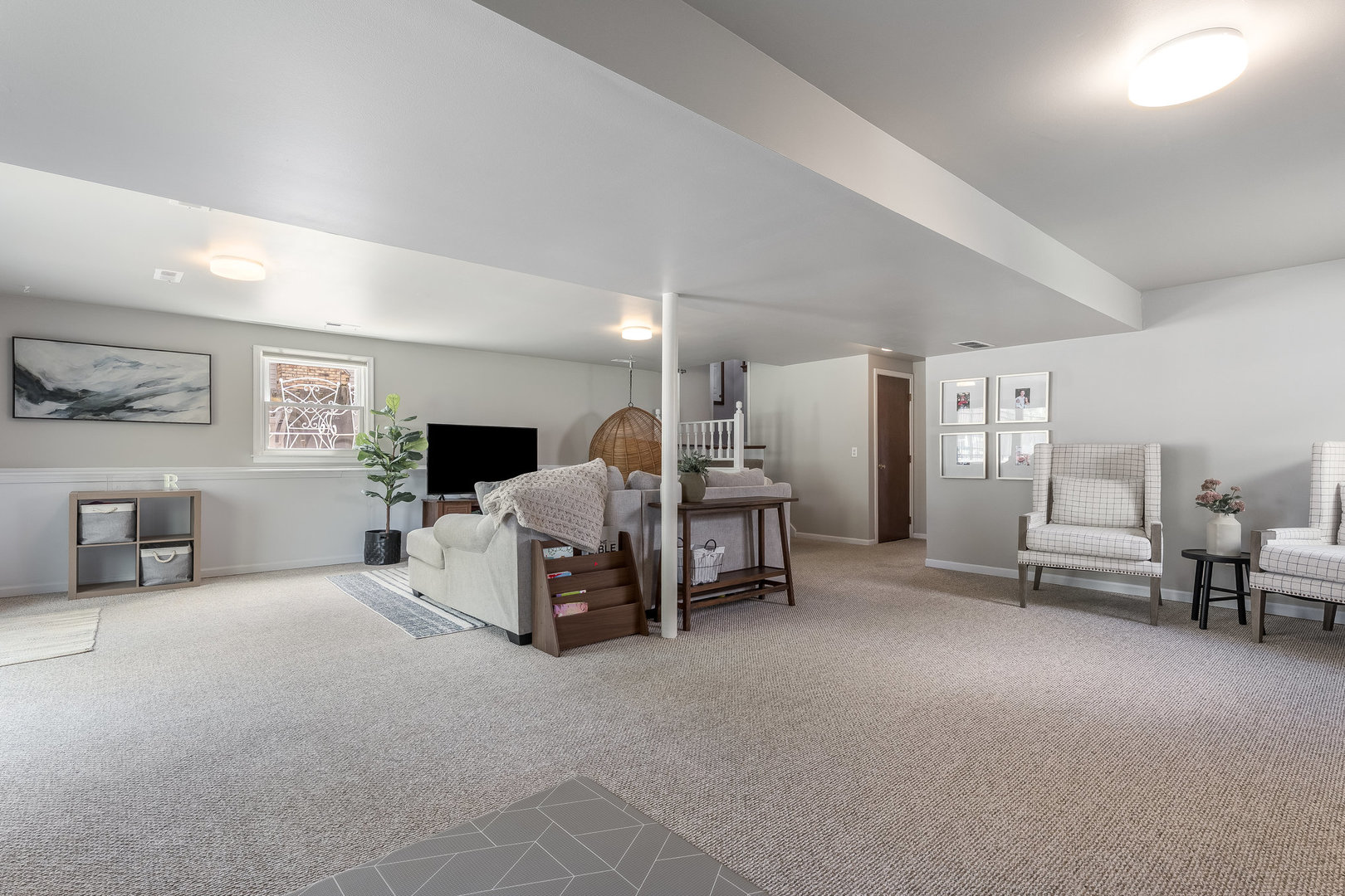 1617 Orth Drive Wheaton, IL 60189 - Photo 19 of 35 a living room with furniture and a chandelier
