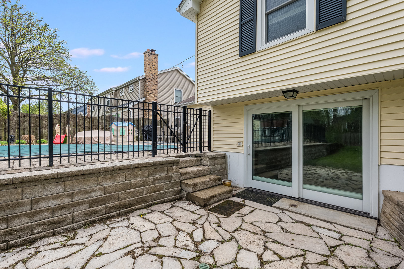 1617 Orth Drive Wheaton, IL 60189 - Photo 23 of 35 a view of a wrought iron fences in front of house