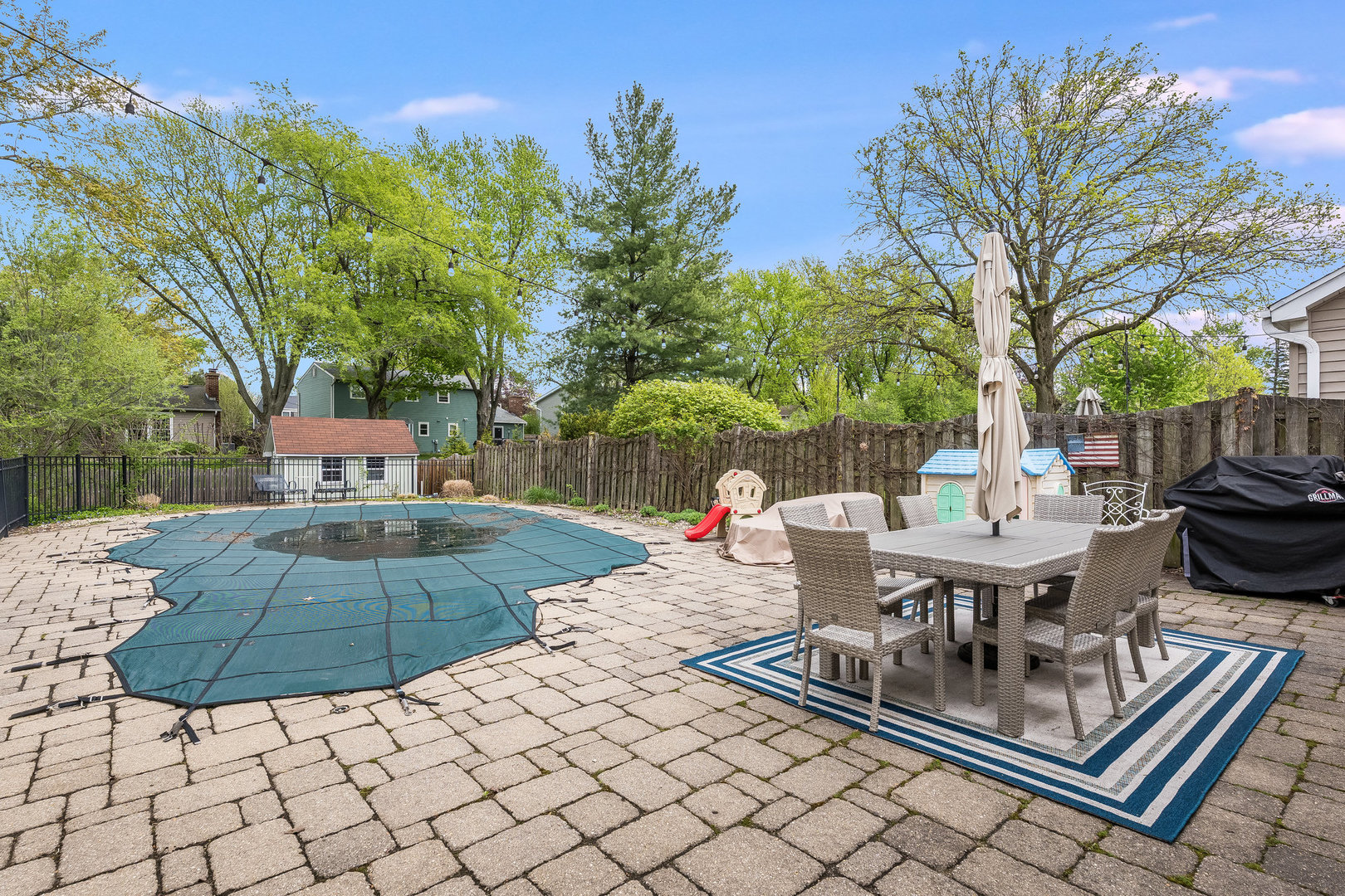 1617 Orth Drive Wheaton, IL 60189 - Photo 24 of 35 a view of a patio with table and chairs and potted plants