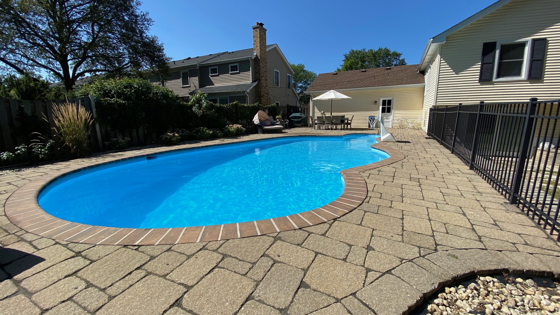 1617 Orth Drive Wheaton, IL 60189 - Photo 26 of 35 a view of a swimming pool with yard