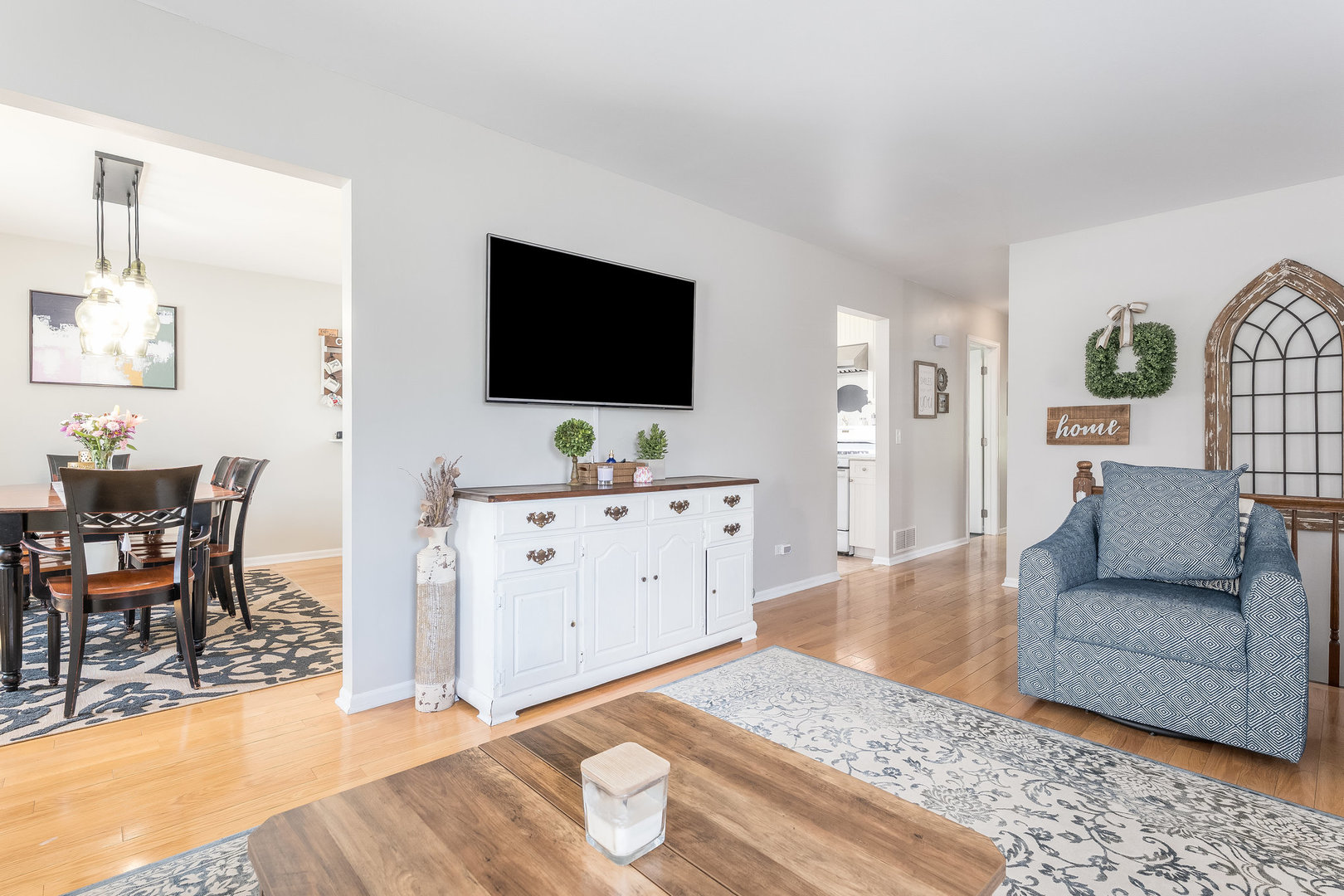 1617 Orth Drive Wheaton, IL 60189 - Photo 5 of 35 a view of a livingroom with furniture and a flat screen tv