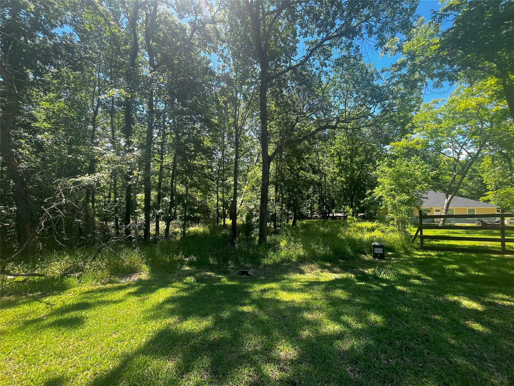 15 Cherry Hills Drive Coldspring, TX 77331 - Photo 4 of 13 The grassy cul- de- sac in front is not part of this lot