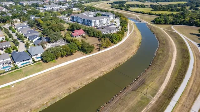 a view of a swimming pool with a balcony
