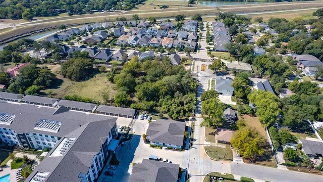 an aerial view of a house and outdoor space
