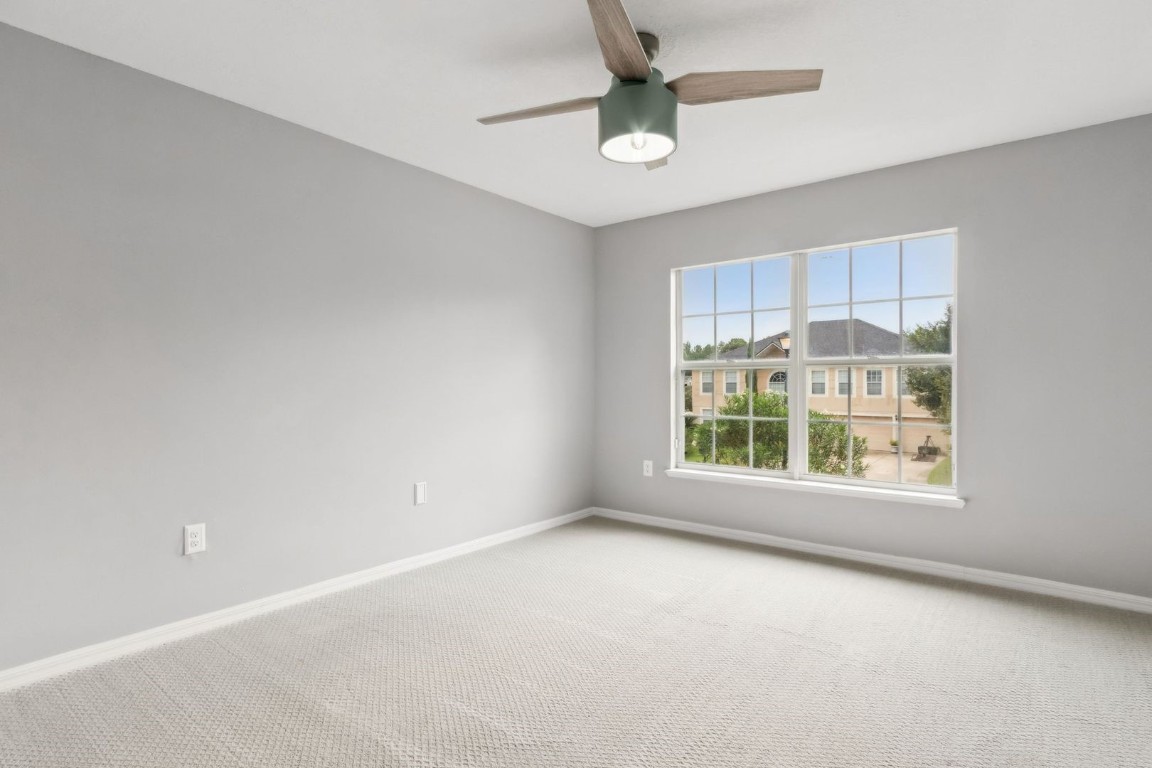76367 Longleaf Loop Yulee, FL 32097 - Photo 19 of 49 an empty room with a window