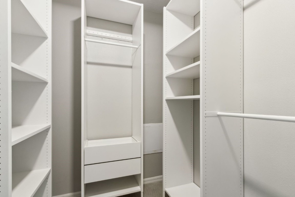 76367 Longleaf Loop Yulee, FL 32097 - Photo 22 of 49 a bathroom with a walk in closet