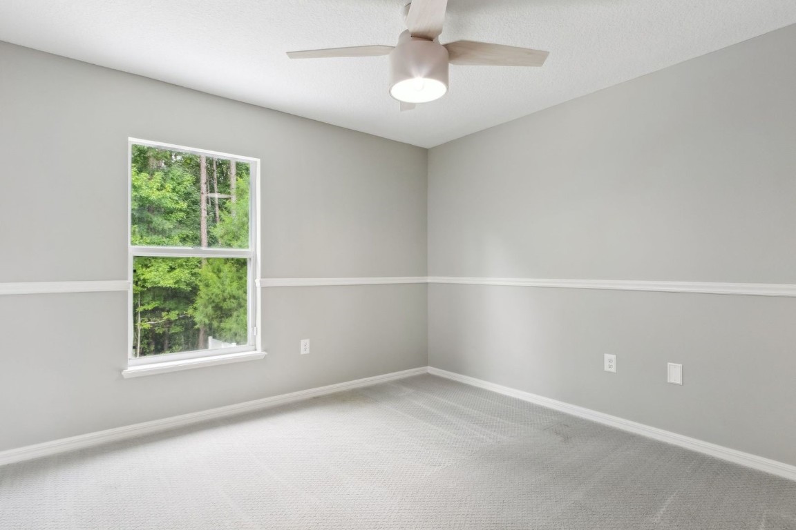 76367 Longleaf Loop Yulee, FL 32097 - Photo 28 of 49 an empty room with a window