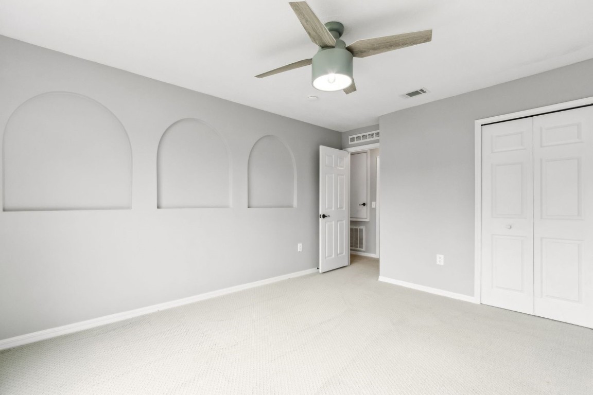 76367 Longleaf Loop Yulee, FL 32097 - Photo 29 of 49 an empty room with ceiling fan