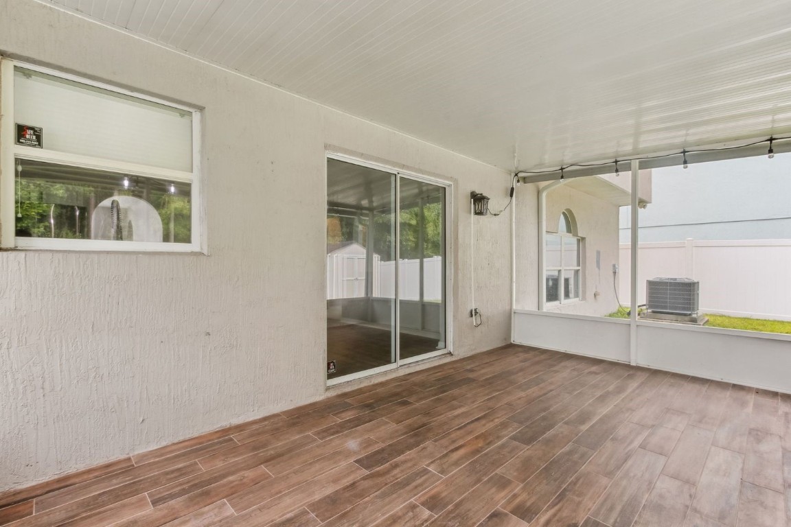 76367 Longleaf Loop Yulee, FL 32097 - Photo 32 of 49 a view of an empty room with a window