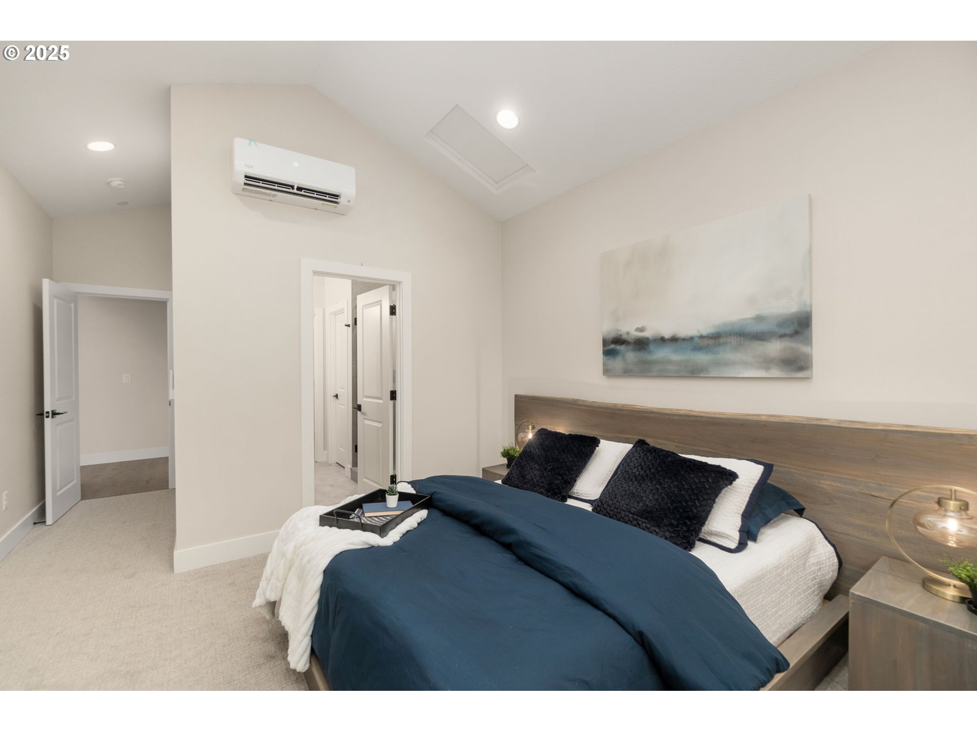 4753 Northwest Camas Meadows Drive Camas, WA 98607 - Photo 11 of 23 a bedroom with a bed and a night stand