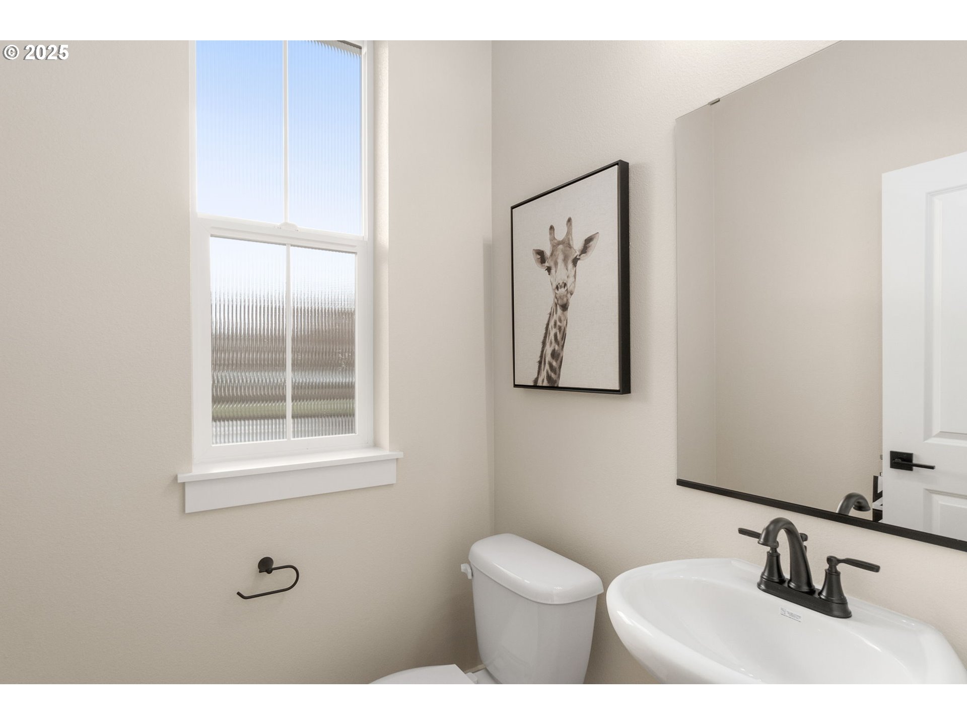 4753 Northwest Camas Meadows Drive Camas, WA 98607 - Photo 16 of 23 a bathroom with a toilet sink and mirror