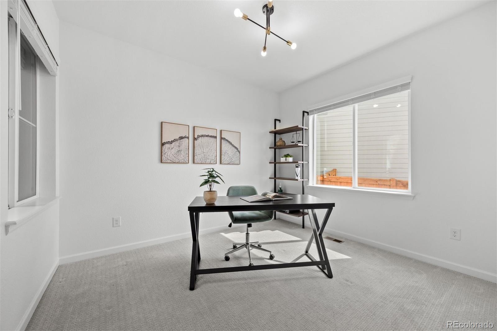 6346 Rockingham Way Castle Pines, CO 80108 - Photo 12 of 43 a view of a workspace with furniture