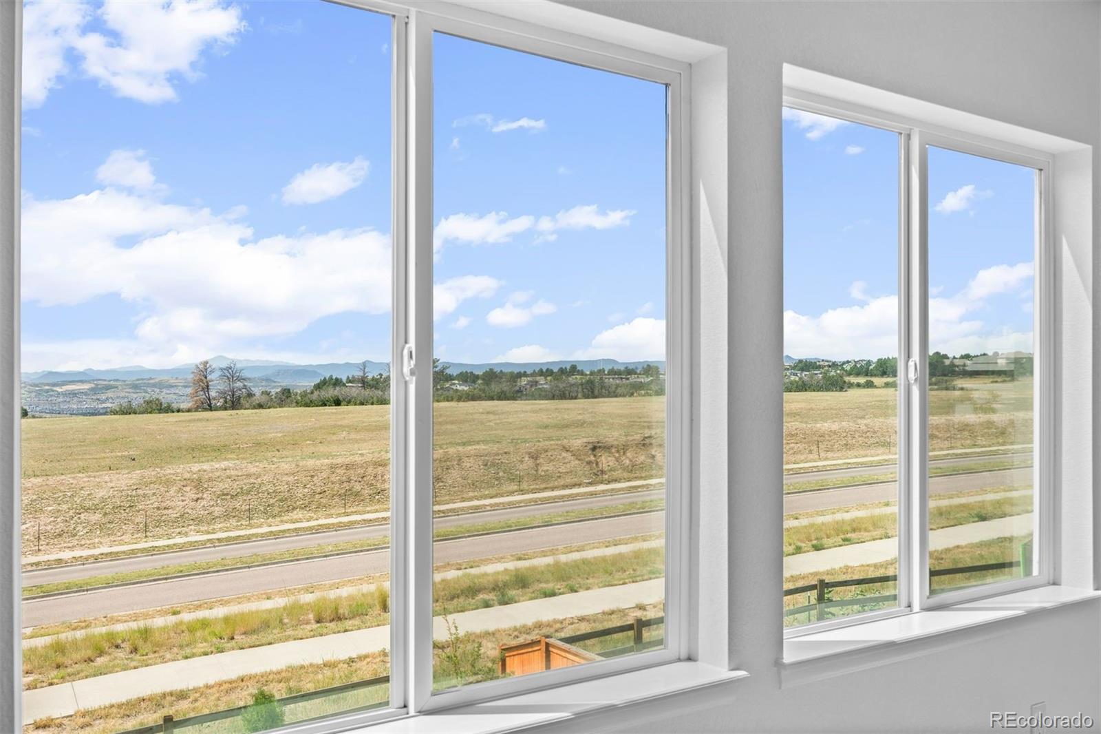 6346 Rockingham Way Castle Pines, CO 80108 - Photo 18 of 43 a view of a glass door