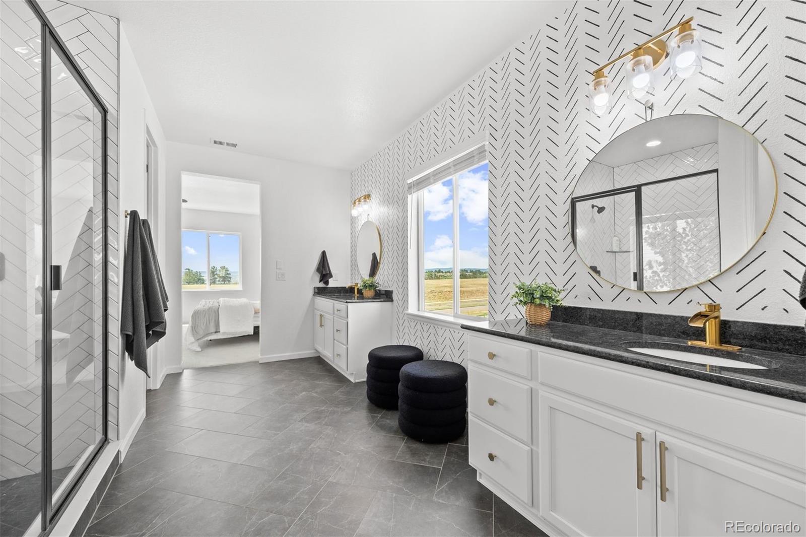 6346 Rockingham Way Castle Pines, CO 80108 - Photo 20 of 43 a kitchen with stainless steel appliances a refrigerator sink and white cabinets