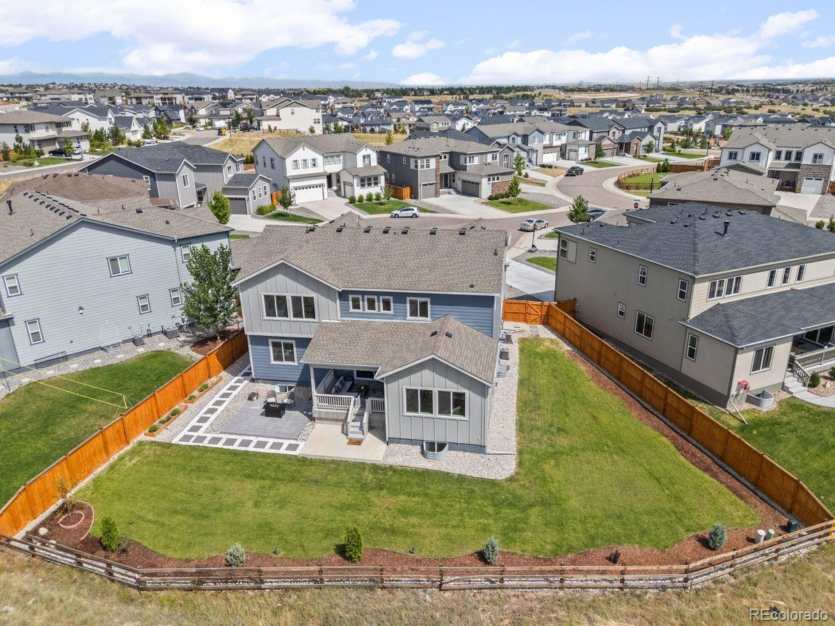 6346 Rockingham Way Castle Pines, CO 80108 - Photo 2 of 43 a view of a city from a terrace