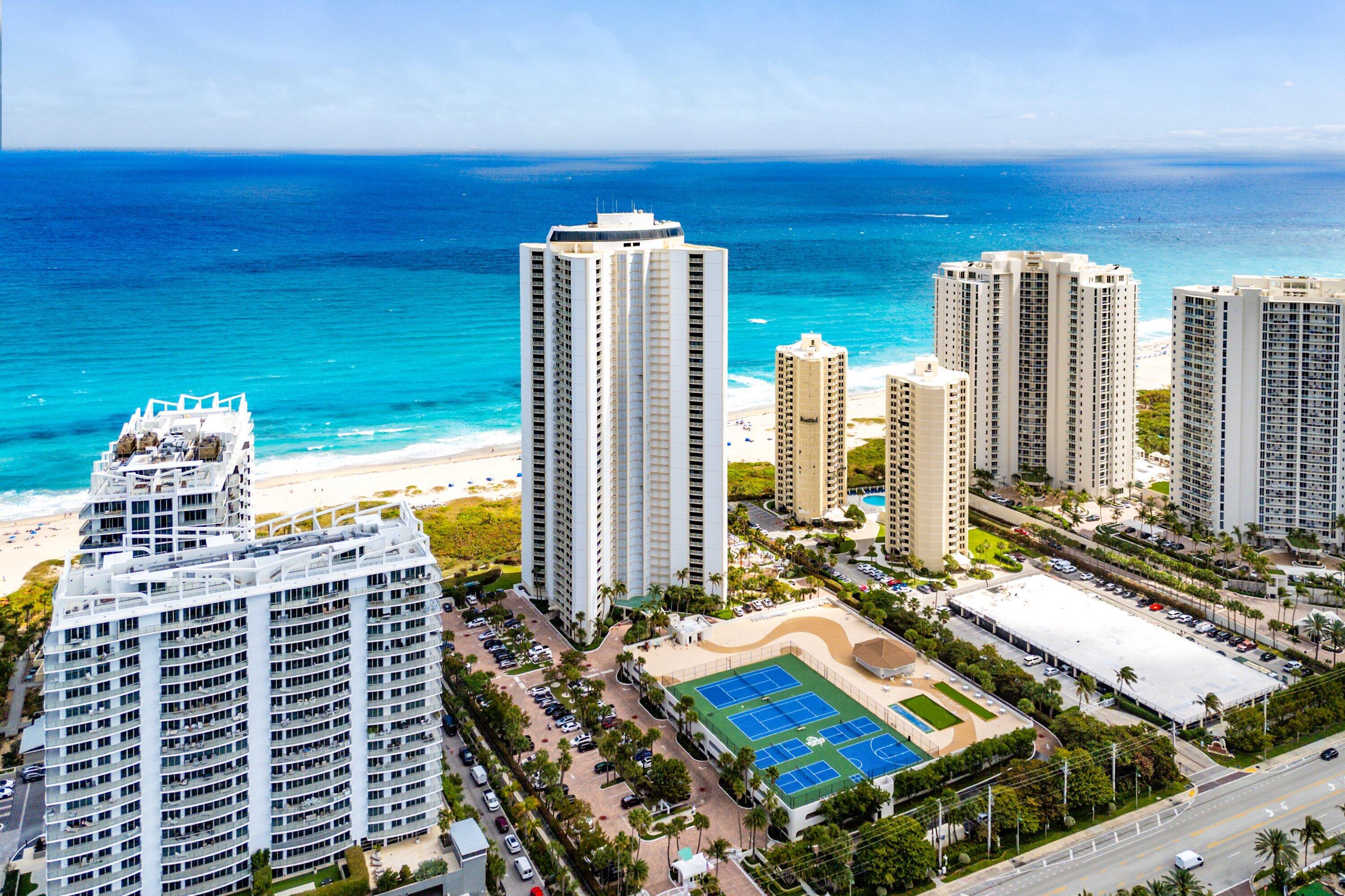 3000 North Ocean Drive, Unit 8F Singer Island, FL 33404 - Photo 43 of 66 a view of balcony with two chairs and a table
