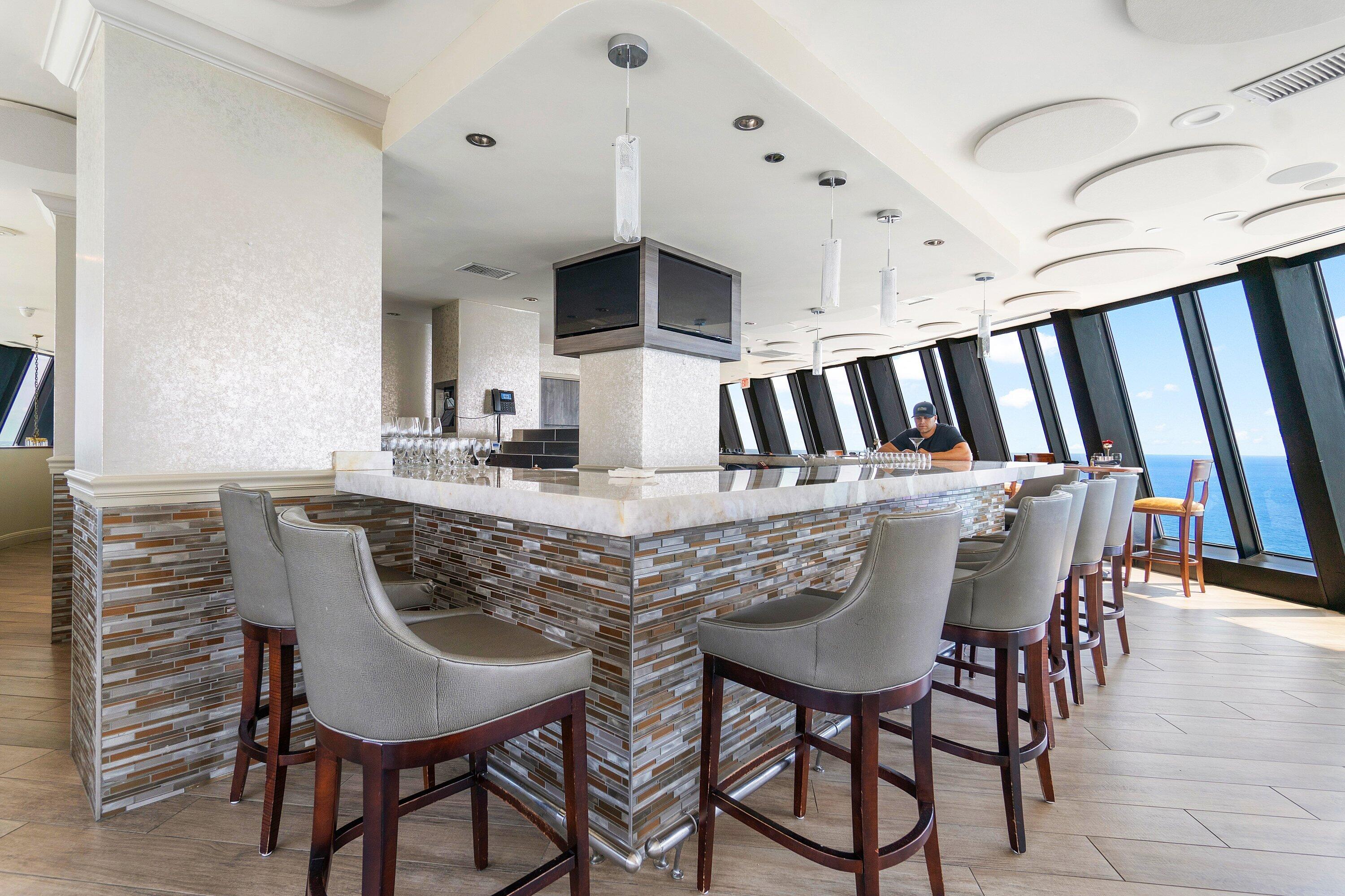 3000 North Ocean Drive, Unit 8F Singer Island, FL 33404 - Photo 48 of 66 a view of a dining room with furniture