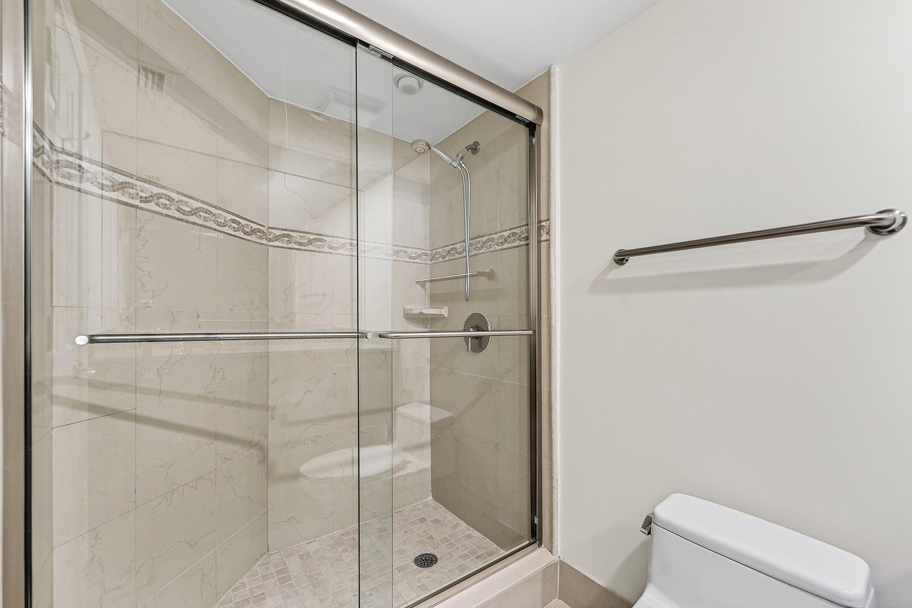 3000 North Ocean Drive, Unit 8F Singer Island, FL 33404 - Photo 7 of 66 a bathroom with a shower