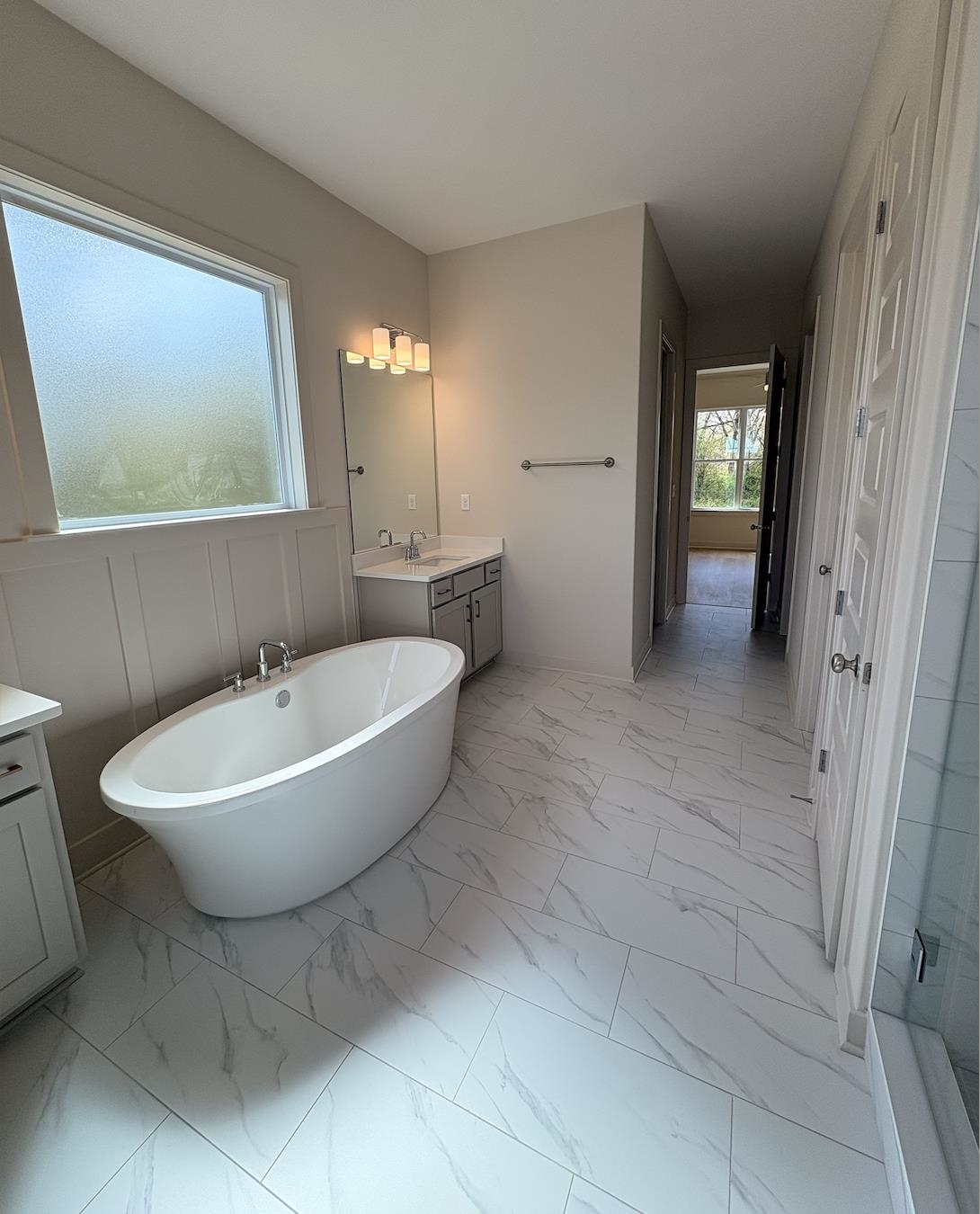 5054 Summers Road Arlington, TN 38002 - Photo 4 of 11 Full bath with vanity, a soaking tub, and light marble finish floors