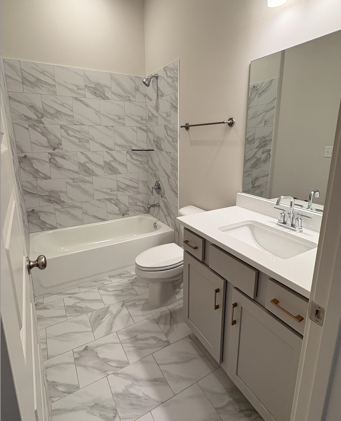 5054 Summers Road Arlington, TN 38002 - Photo 9 of 11 Full bath with light marble finish floors, vanity, and shower / bath combination