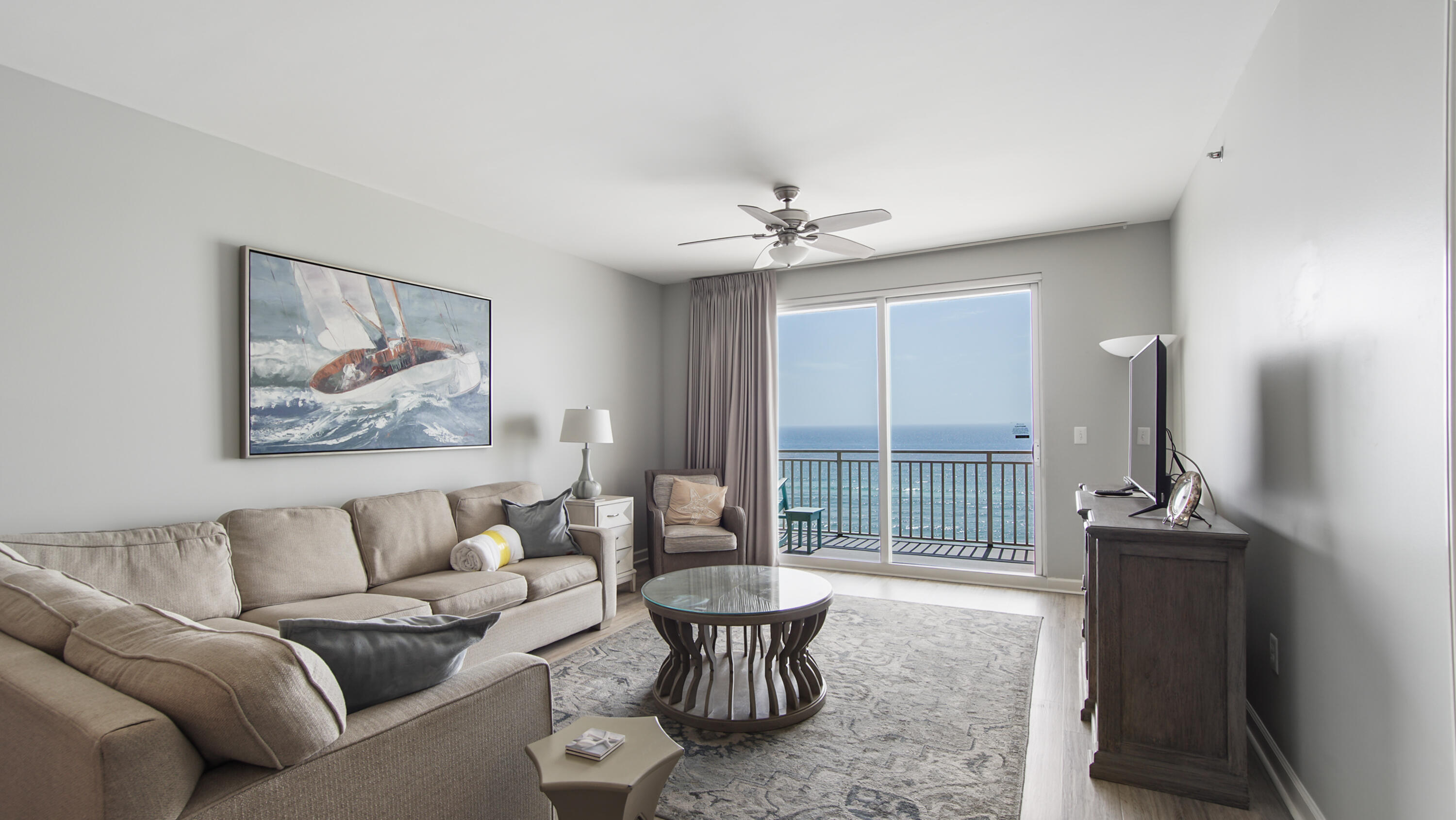 17739 Front Beach Road, Unit 507W Panama City Beach, FL 32413 - Photo 18 of 49 a living room with furniture and a large window