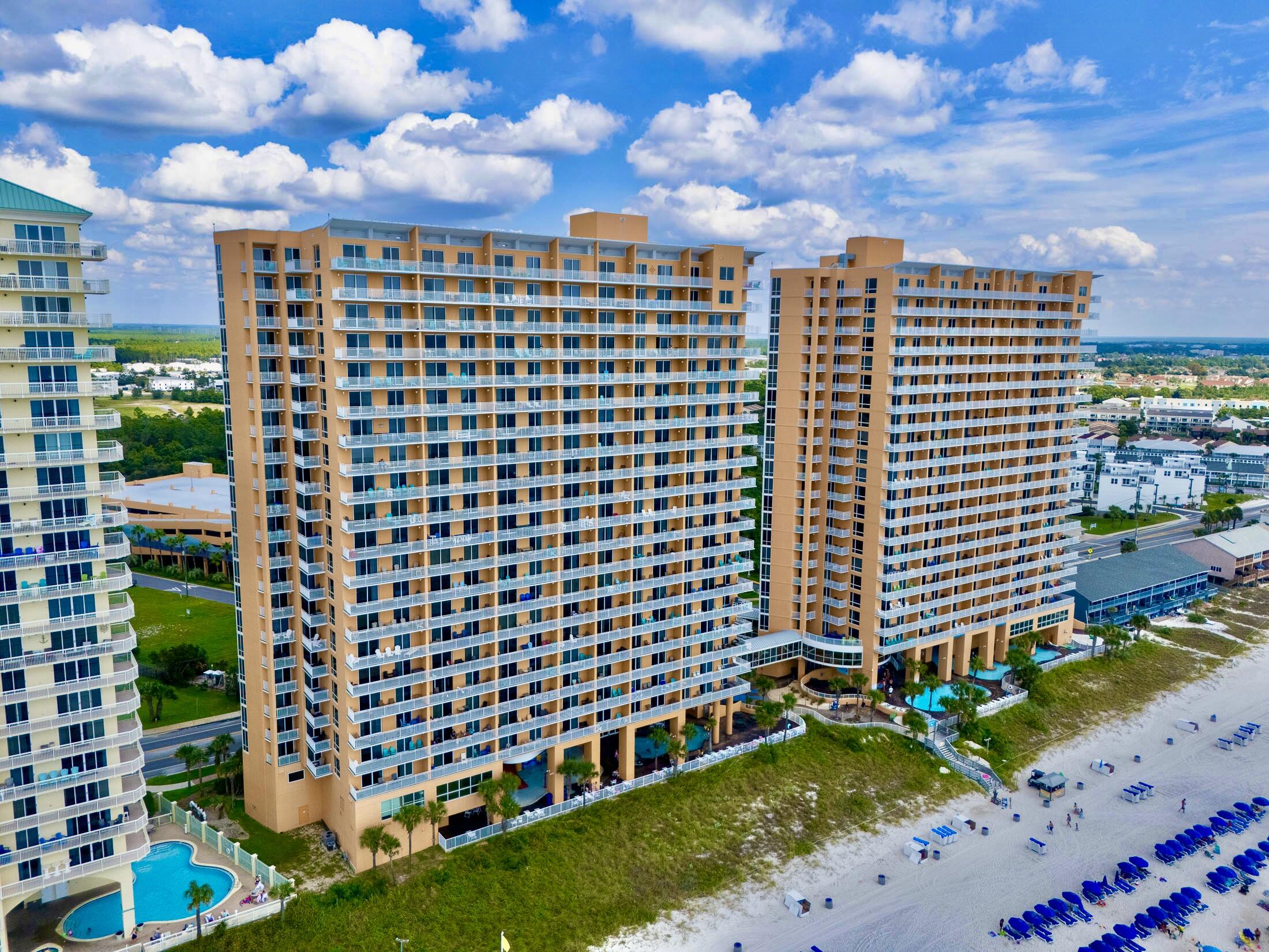 17739 Front Beach Road, Unit 507W Panama City Beach, FL 32413 - Photo 39 of 49 a view of a building with a yard