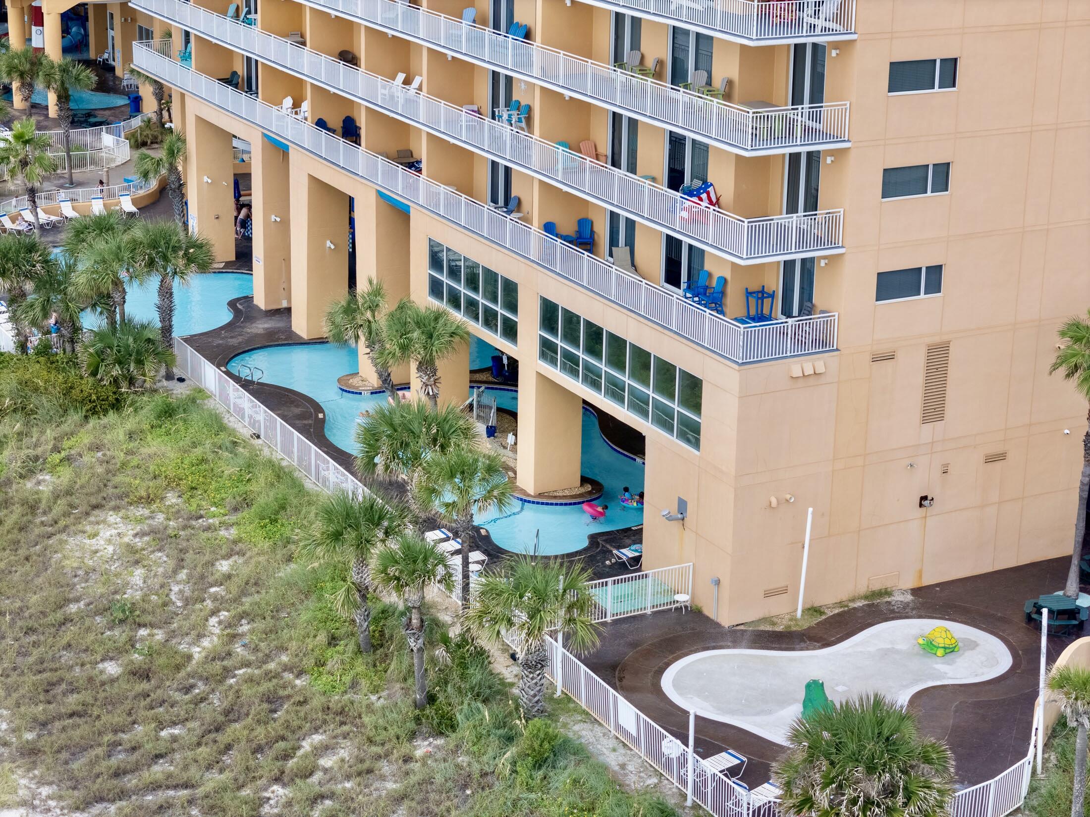 17739 Front Beach Road, Unit 507W Panama City Beach, FL 32413 - Photo 42 of 49 a front view of a multi story residential apartment building