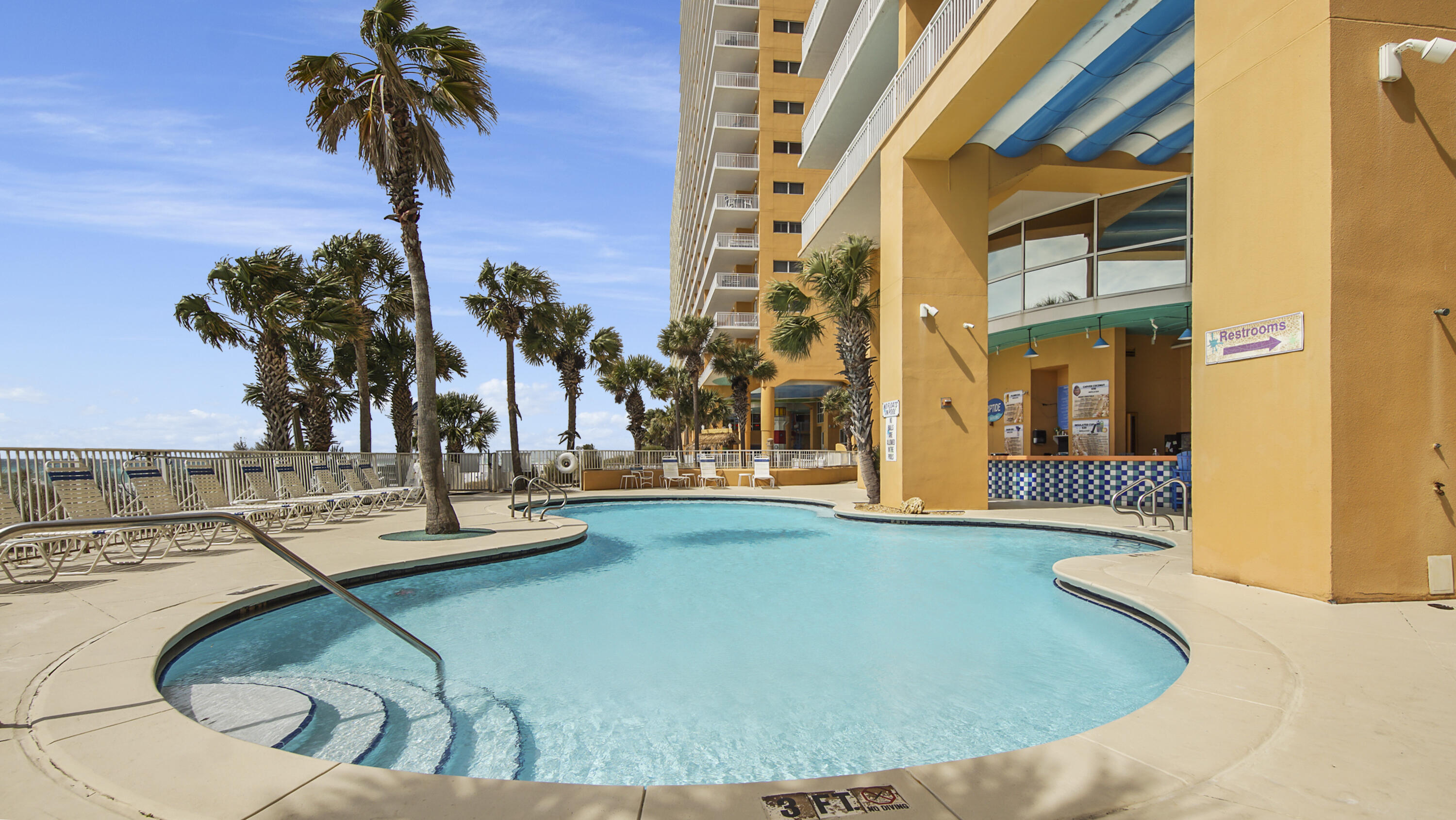 17739 Front Beach Road, Unit 507W Panama City Beach, FL 32413 - Photo 46 of 49 a view of a swimming pool with outdoor seating