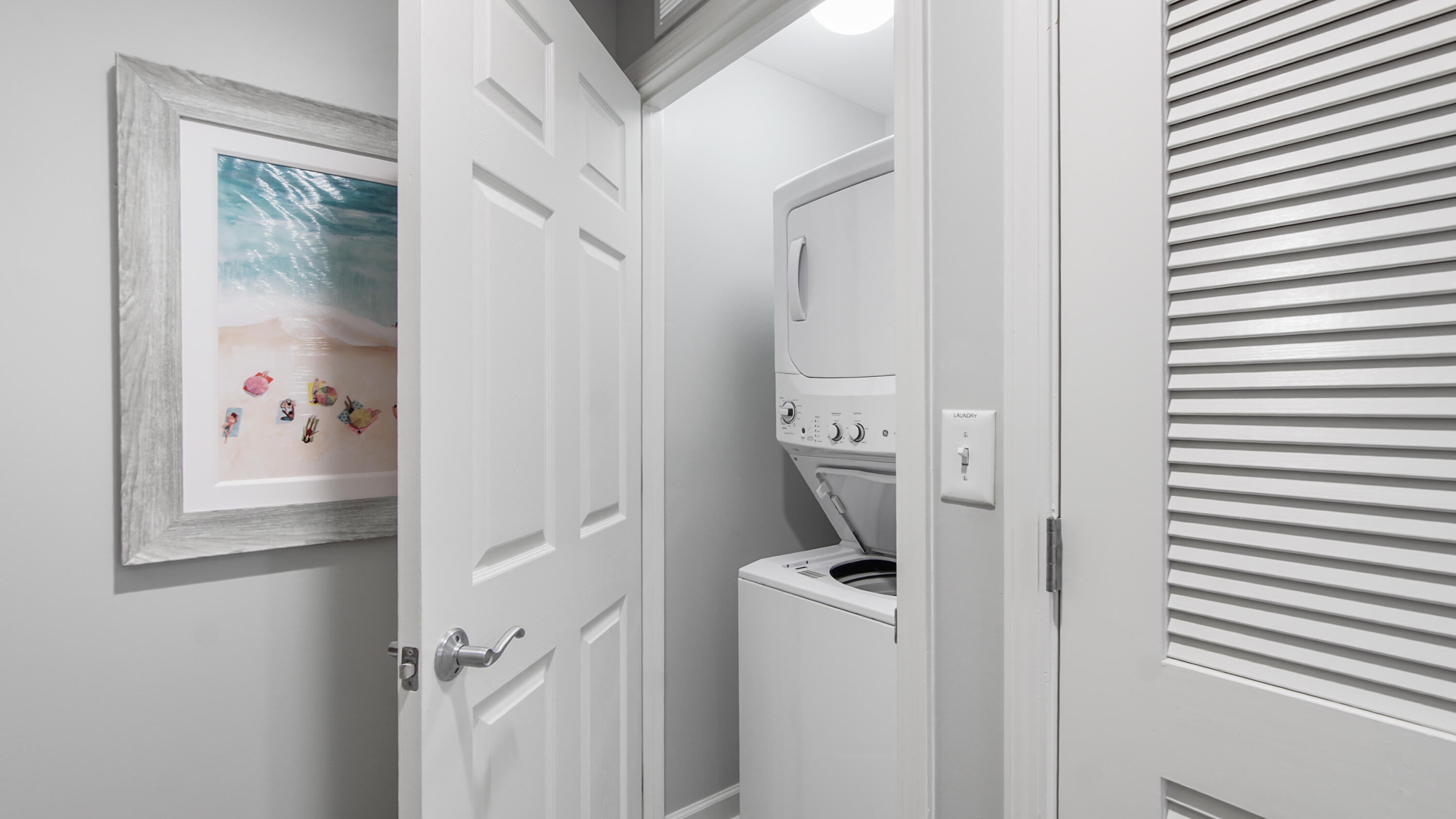 17739 Front Beach Road, Unit 507W Panama City Beach, FL 32413 - Photo 8 of 49 a bathroom with a refrigerator and a stove