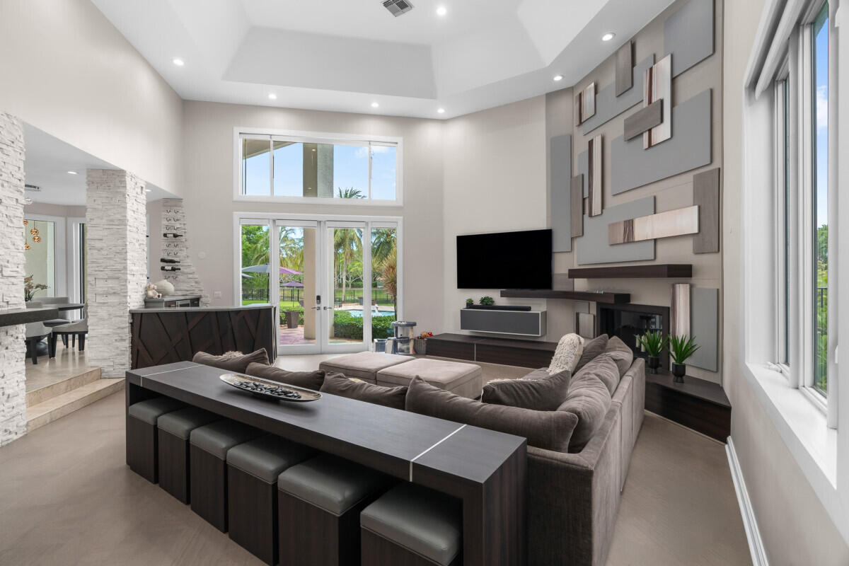 3500 Windmill Ranch Road Weston, FL 33331 - Photo 23 of 47 a living room with furniture fireplace and flat screen tv