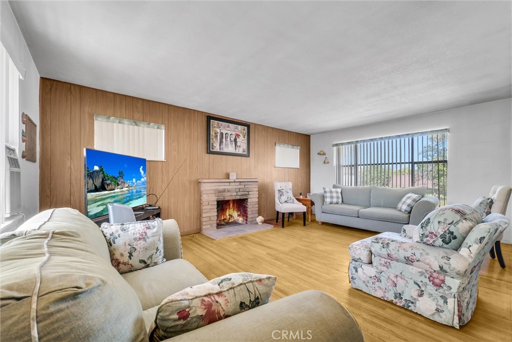 2551 Rome Avenue Anaheim, CA 92804 - Photo 5 of 27 a living room with furniture fireplace and a window