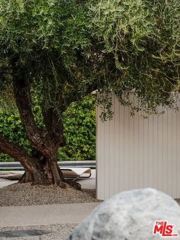 a view of a hallway with seating area
