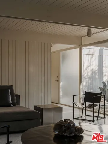 a view of balcony with furniture