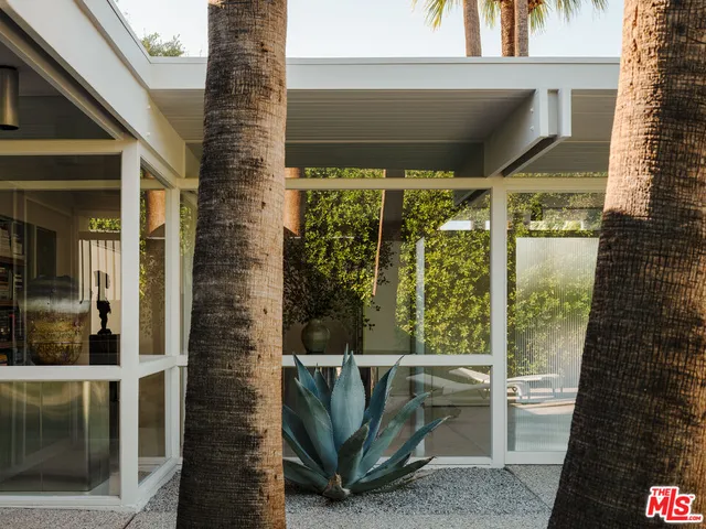 a view of a room with a table and chair