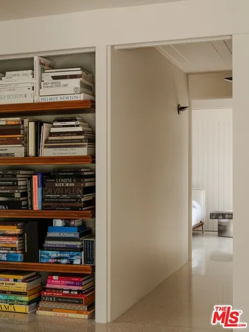 a view of a house with a flowers in front of it