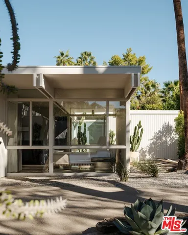 a vase of flowers sitting on a table