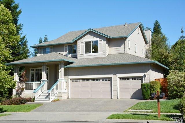 5865 Mountain Hawk Drive Santa Rosa, CA 95409 - Photo 1 of 1 a front view of a house with a yard and garage