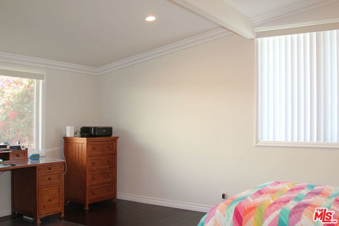 3641 Surfwood Road Malibu, CA 90265 - Photo 16 of 29 a view of a bedroom with a window