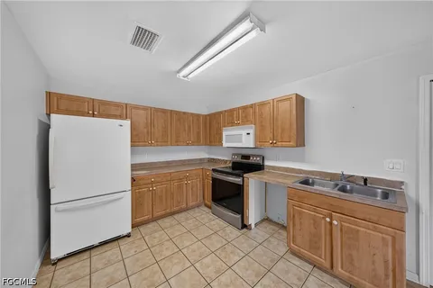 $329,000 | 1133-1135 Gordon Avenue South, Lehigh Acres, FL 33973