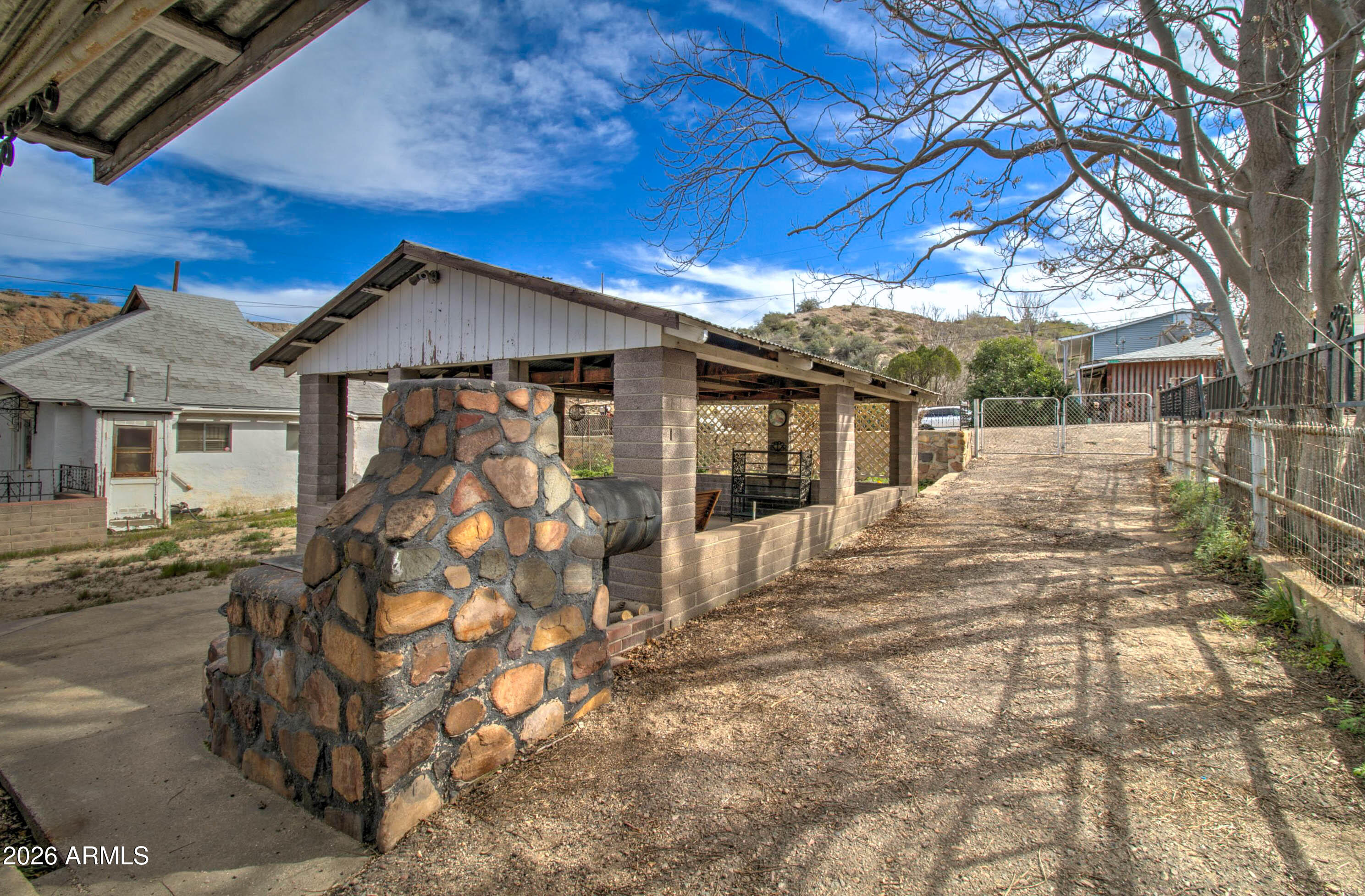 6002 Marion Canyon Street Claypool, AZ 85532 - Photo 11 of 45 a view of a house with a yard