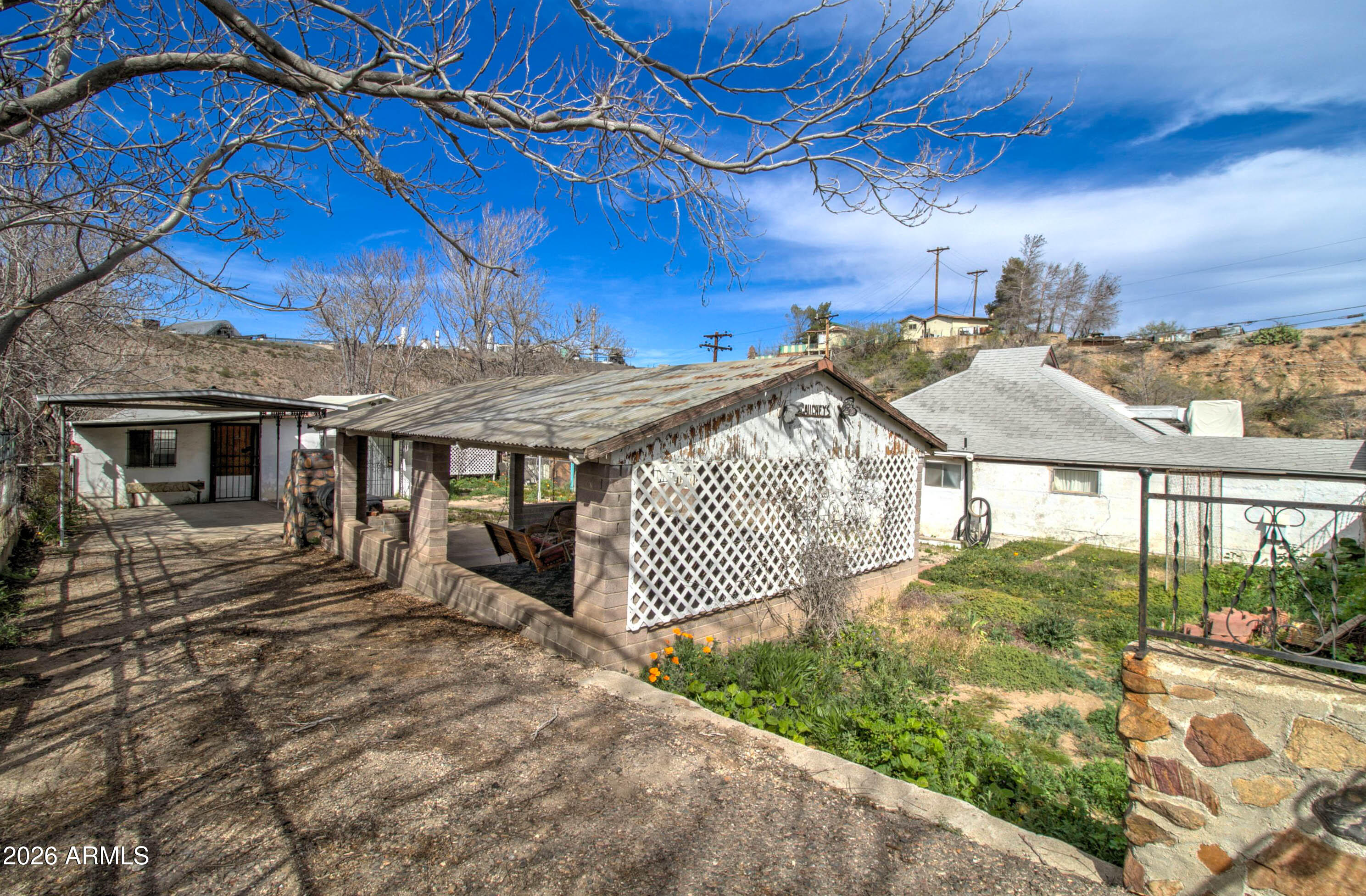 6002 Marion Canyon Street Claypool, AZ 85532 - Photo 12 of 45 a front view of a house with a yard