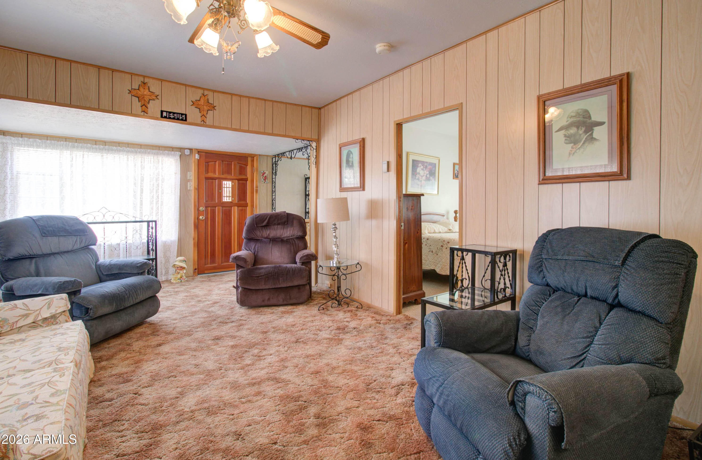 6002 Marion Canyon Street Claypool, AZ 85532 - Photo 20 of 45 a living room with furniture and a large window