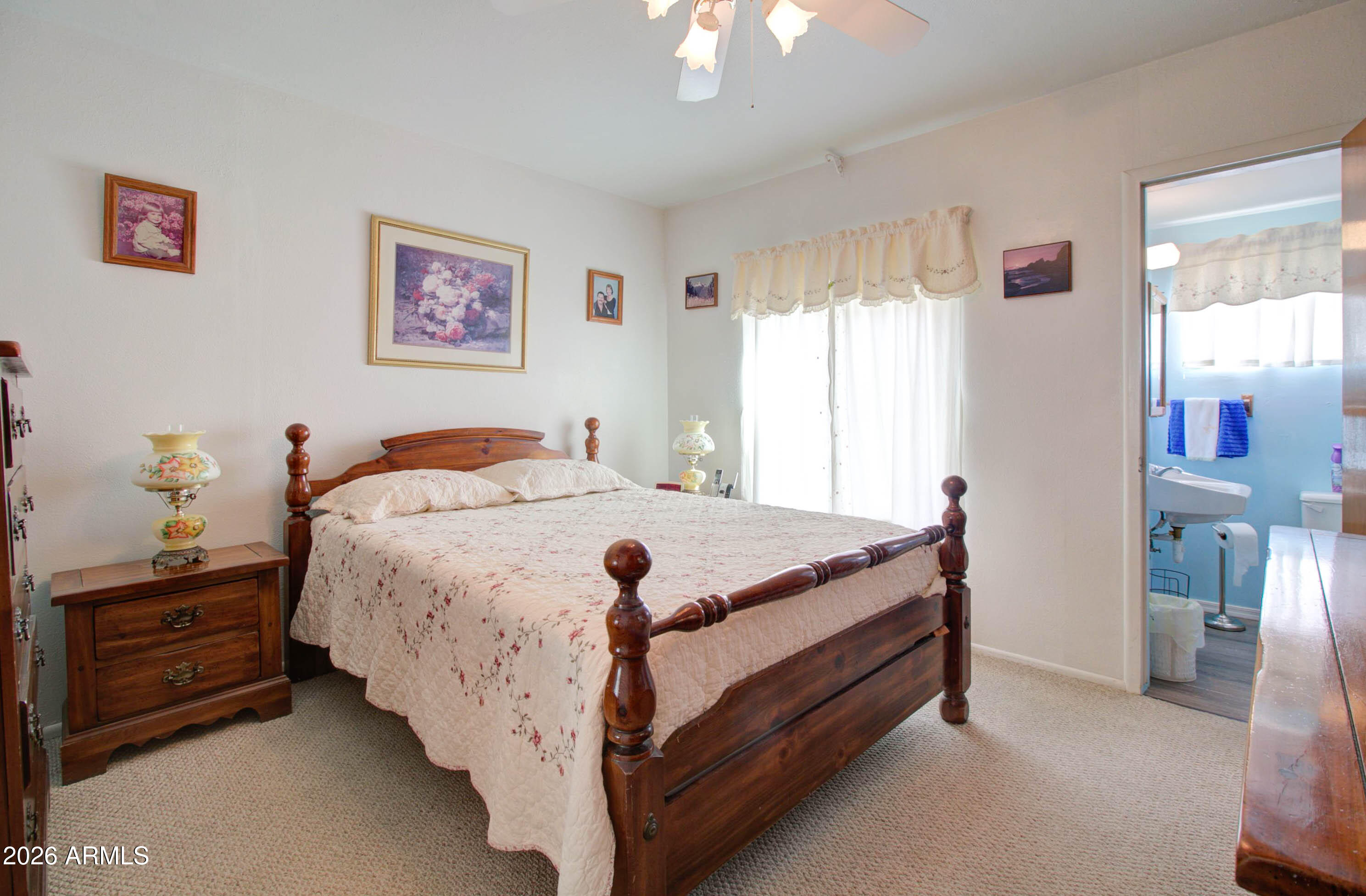 6002 Marion Canyon Street Claypool, AZ 85532 - Photo 22 of 45 a bed room with a bed and a dresser