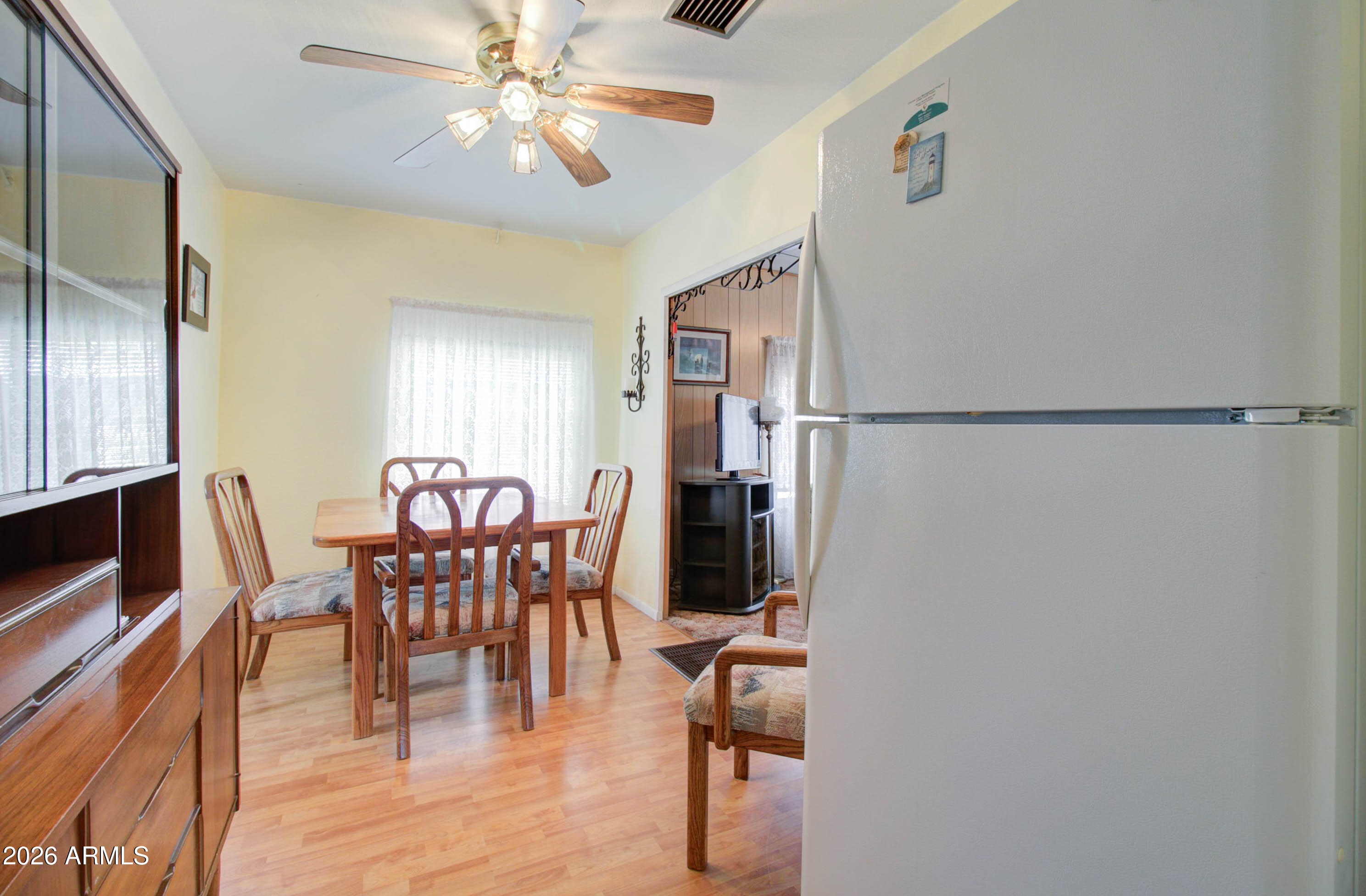 6002 Marion Canyon Street Claypool, AZ 85532 - Photo 26 of 45 a dining room with furniture and window