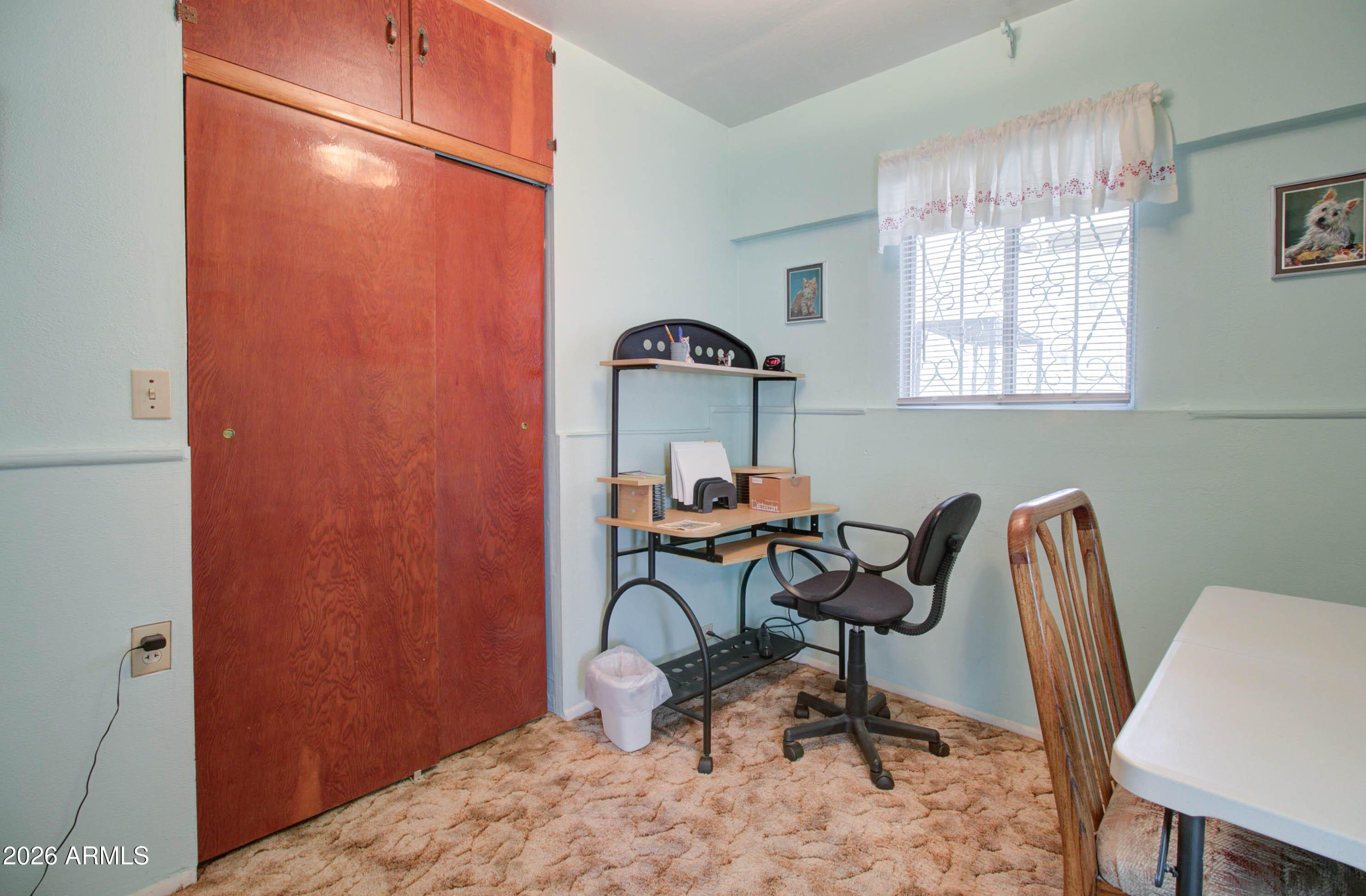 6002 Marion Canyon Street Claypool, AZ 85532 - Photo 27 of 45 a workspace with furniture and a window