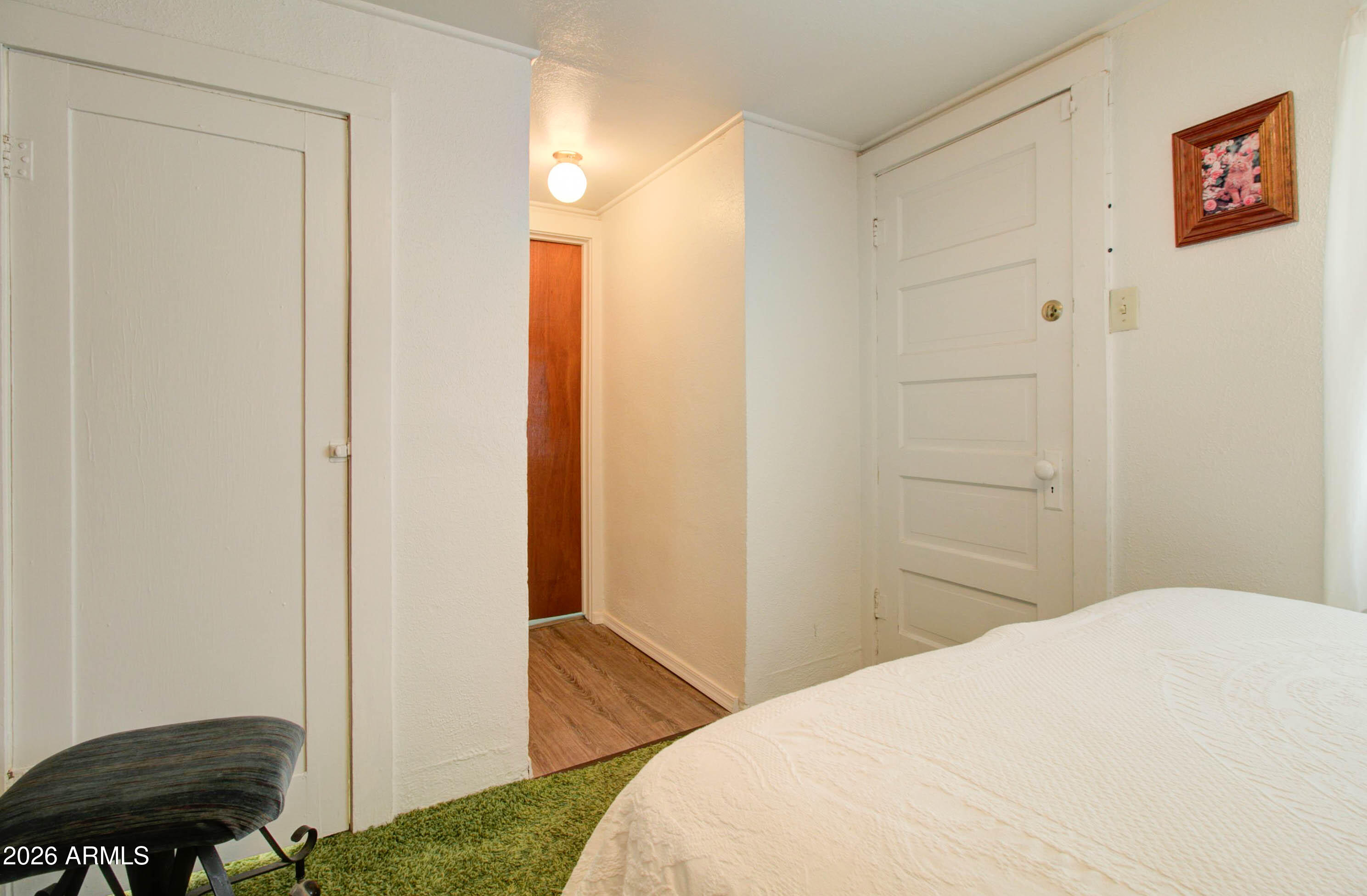 6002 Marion Canyon Street Claypool, AZ 85532 - Photo 34 of 45 a bedroom with a bed and a furniture