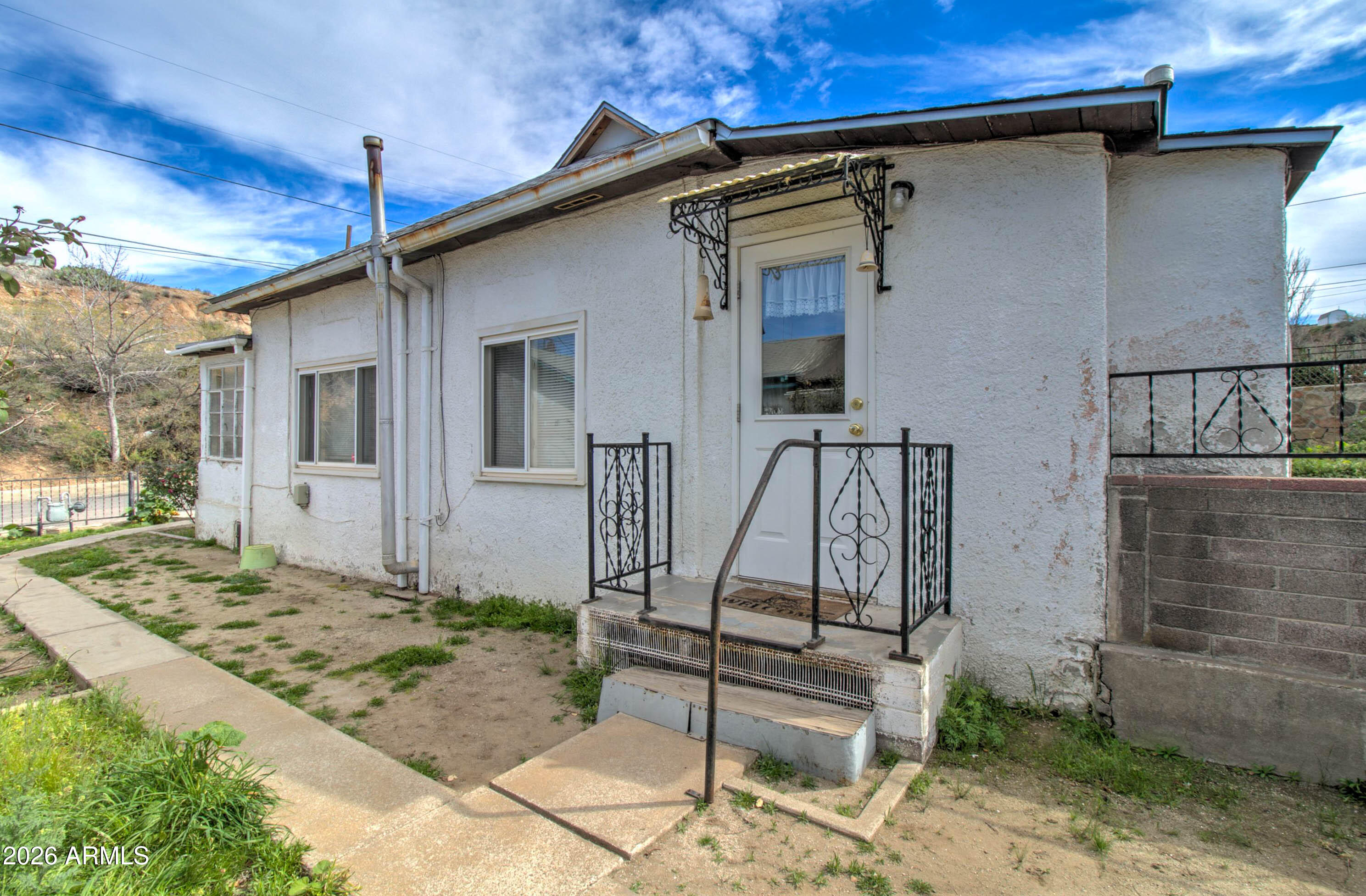 6002 Marion Canyon Street Claypool, AZ 85532 - Photo 7 of 45 a front view of a house with a yard